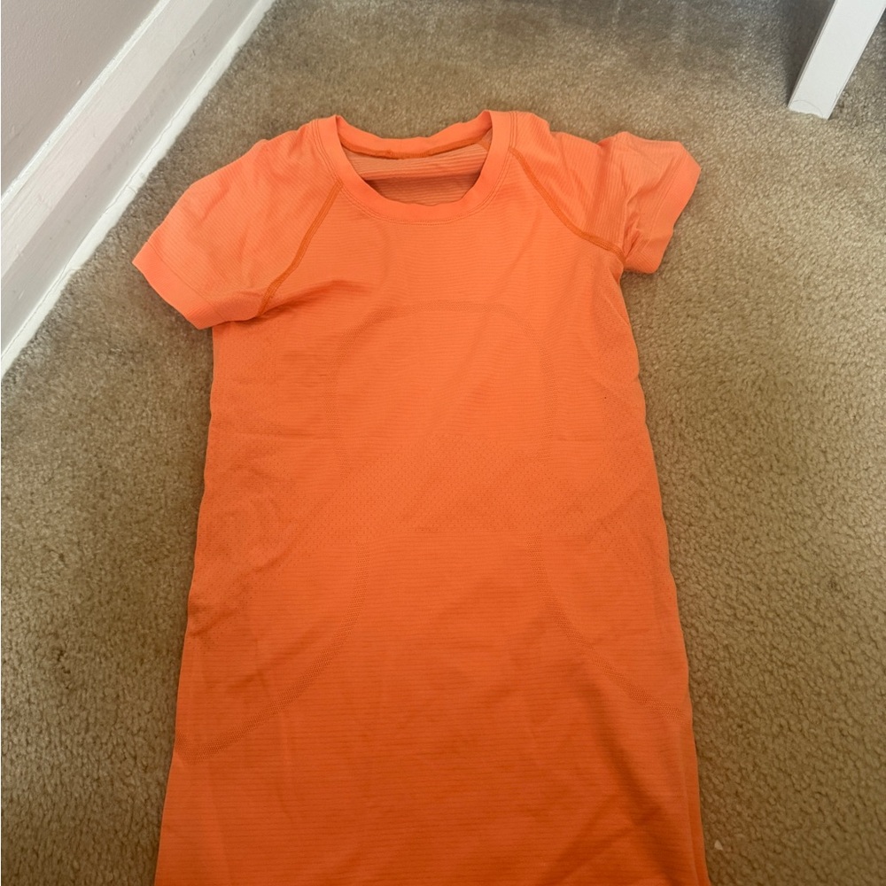 Lululemon swiftly tech | size 4 orange